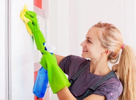 Cleaner reviewing safety procedures before starting work