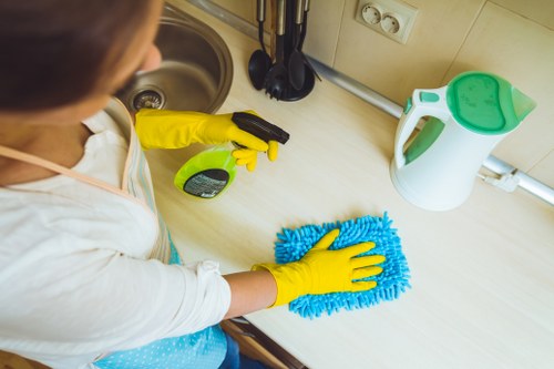 Person reviewing a cleaning complaint form with notes and checklist