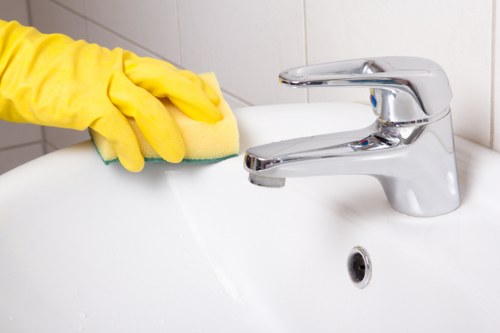 Supervisor checking service records during a cleaning complaint review