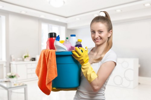 Professional cleaner using specialized tools on a surface