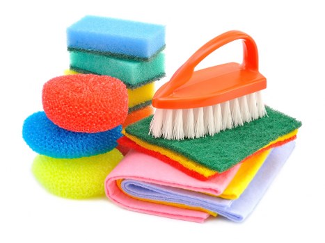 Cleaner reviewing service checklist before starting work