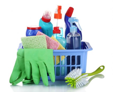 Charity donation items and reusable cleaning supplies arranged for reuse